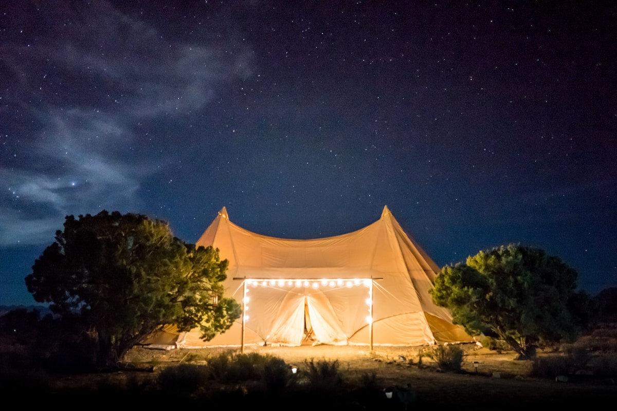 Sustainable camping Scottish Highlands - tent among mountains
